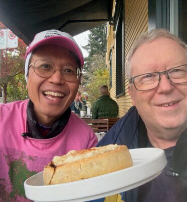 Dale and Roland hold a shepherd's pie at Commercial Street Cafe, Vancouver, Canada after podcasting about Episode 1 and 2 of Apple TV's Pluribus