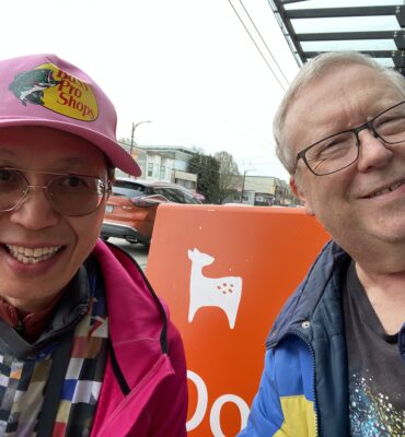 Dale and Roland outside Doe Coffee on a cloudy day on East Hastings. March 27, 2026